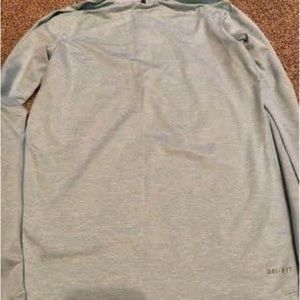 Ladies Nike long sleeve 1/4 zip pullover Dri fit shirt
Small